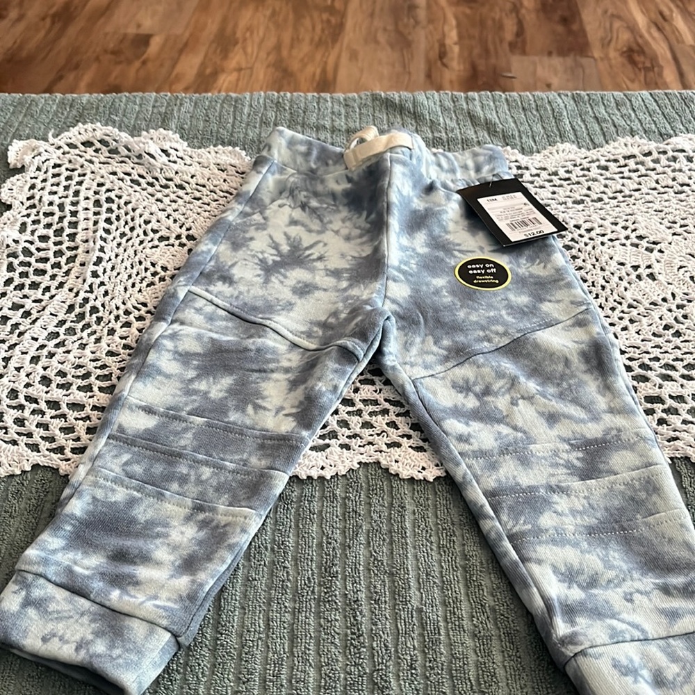 18M. Adorable blue draw string sweatpants.  Easy on easy off.   NWT.